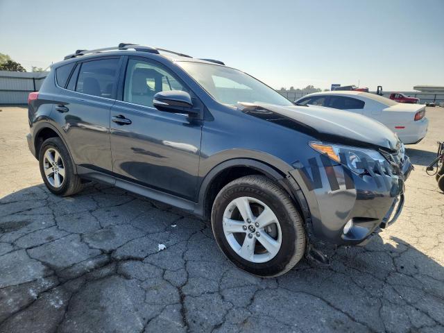 Photo 4 from auction – 2015 TOYOTA RAV4 XLE with VIN JTMRFREV0FD110921