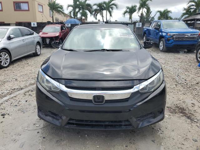 Photo 5 from auction – 2016 HONDA CIVIC LX with VIN 2HGFC2F58GH568830