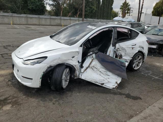 TESLA MODEL Y 2023 with VIN 7SAYGDEE4PF638745 - Photo from auction