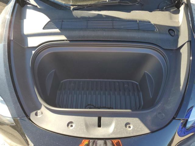 Photo 12 from auction – 2023 TESLA MODEL Y with VIN 7SAYGDEE2PF604965