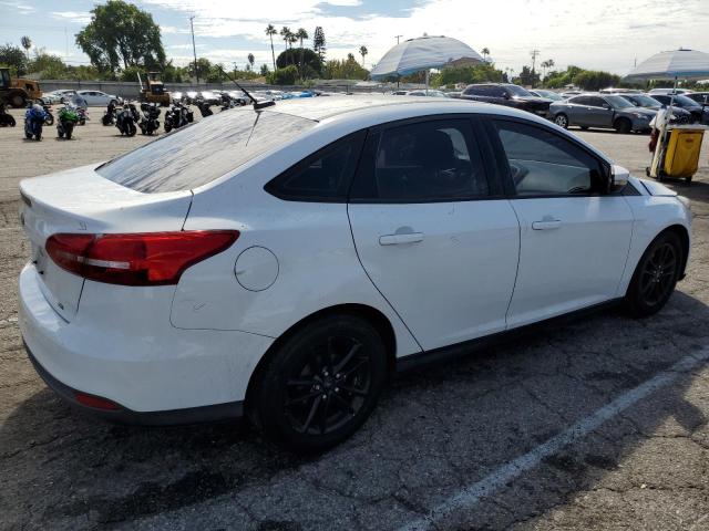 Photo 3 from auction – 2016 FORD FOCUS SE with VIN 1FADP3F24GL254042