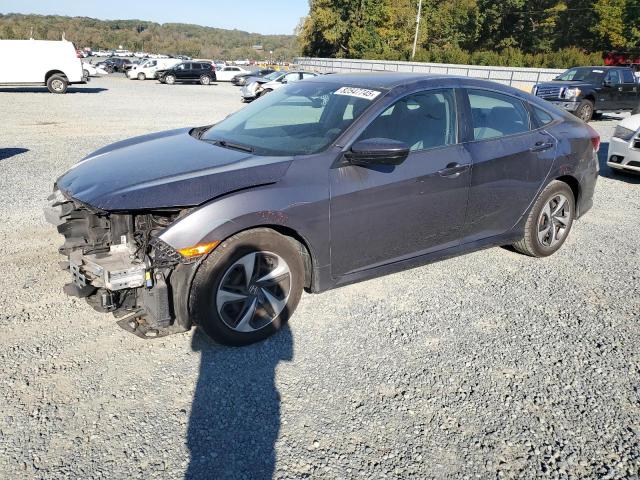 HONDA CIVIC LX 2019 with VIN 19XFC2F62KE044455 - Photo from auction