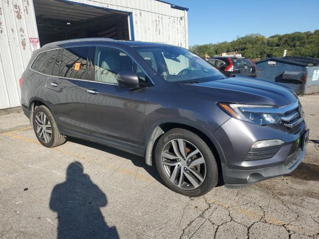 Photo 4 from auction – 2017 HONDA PILOT TOURING with VIN 5FNYF6H96HB012321