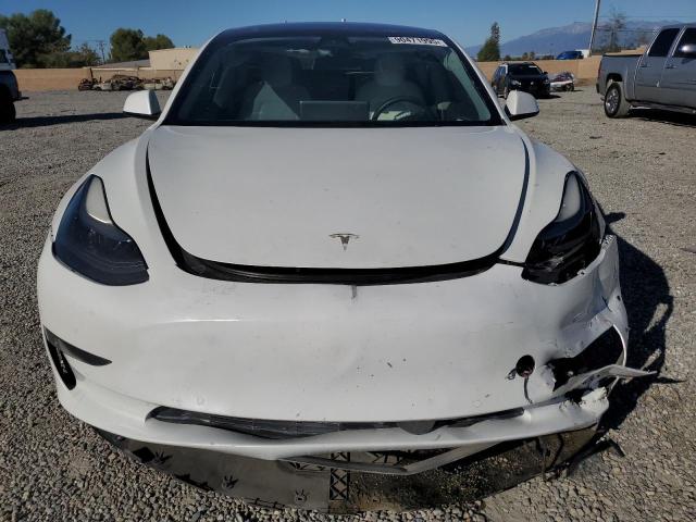 Photo 5 from auction – 2021 TESLA MODEL 3 with VIN 5YJ3E1EA9MF063840