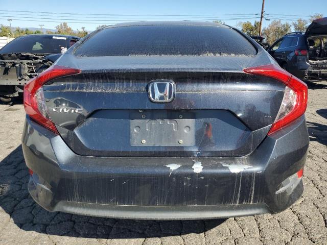 Photo 6 from auction – 2017 HONDA CIVIC LX with VIN 2HGFC2F52HH523545