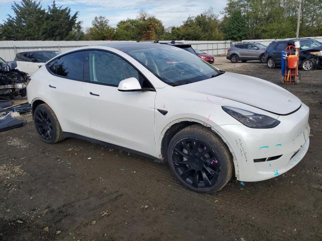 Photo 4 from auction – 2023 TESLA MODEL Y with VIN 7SAYGAEE4PF856070
