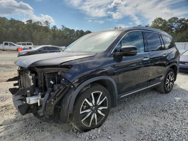 Photo 1 from auction – 2021 HONDA PILOT TOUR with VIN 5FNYF6H69MB059200