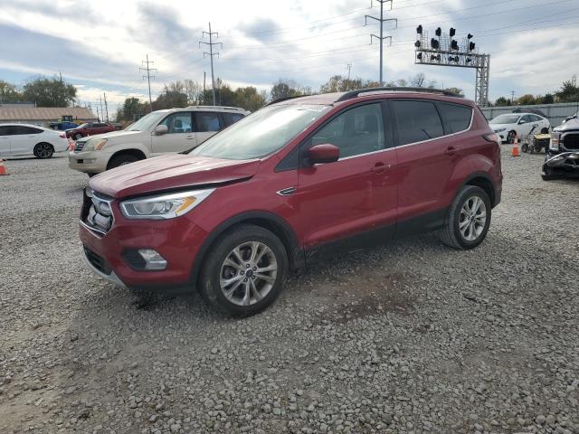 FORD ESCAPE 2018 with VIN 1FMCU9HD7JUA20636 - Photo from auction