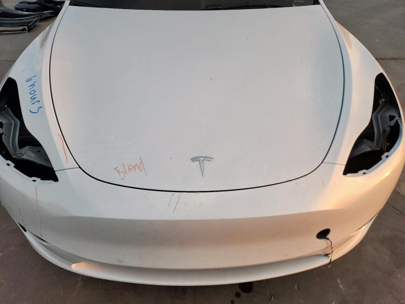 Photo 11 from auction – 2021 TESLA MODEL Y with VIN 5YJYGDEE0MF287048