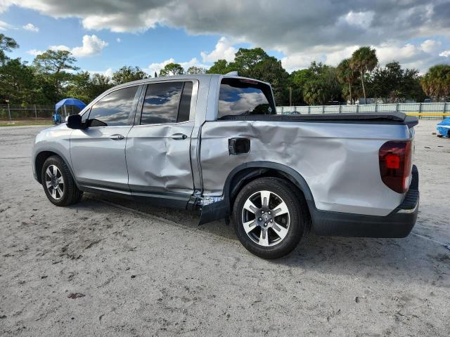 Photo 2 from auction – 2018 HONDA RIDGELINE with VIN 5FPYK2F50JB001798