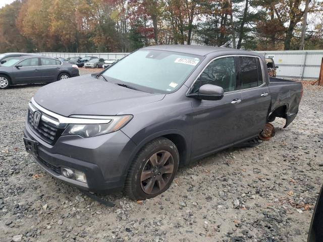 HONDA RIDGELINE 2017 with VIN 5FPYK3F73HB028740 - Photo from auction