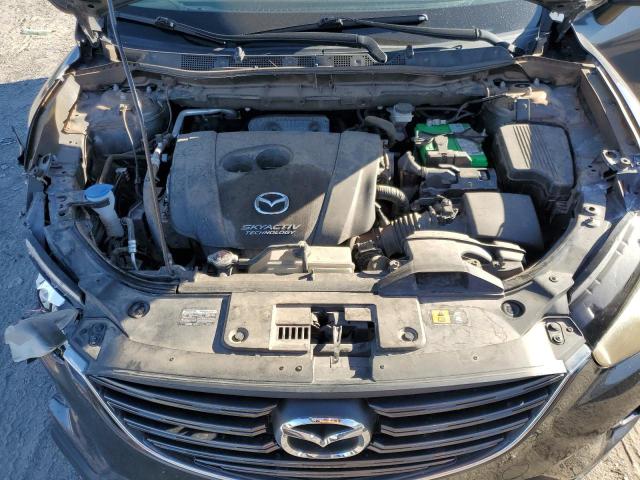 Photo 11 from auction – 2016 MAZDA CX-5 GT with VIN JM3KE2DY2G0688722
