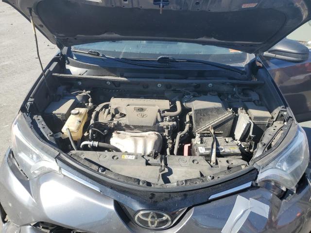 Photo 11 from auction – 2018 TOYOTA RAV4 LE with VIN JTMBFREV5JJ730062