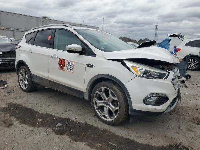 Photo 4 from auction – 2017 FORD ESCAPE TIT with VIN 1FMCU9J96HUD06574