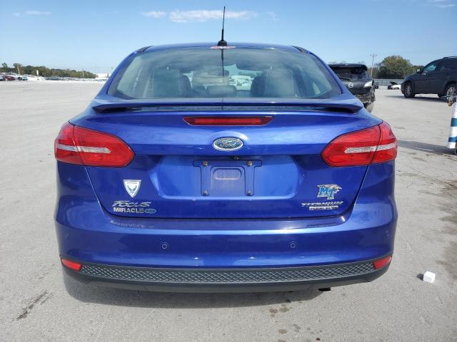 Photo 6 from auction – 2015 FORD FOCUS TITA with VIN 1FADP3J22FL285229