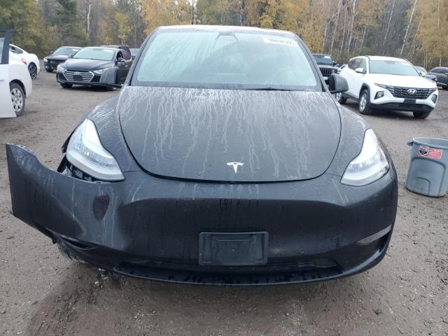 Photo 5 from auction – 2021 TESLA MODEL Y with VIN 5YJYGDED3MF121095