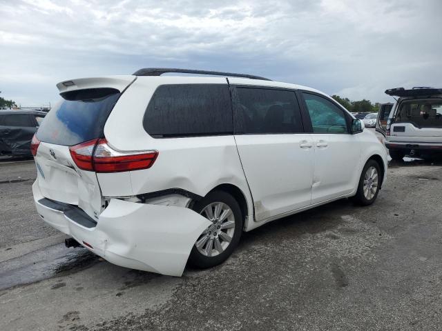 Photo 3 from auction – 2015 TOYOTA SIENNA LE with VIN 5TDJK3DCXFS105252