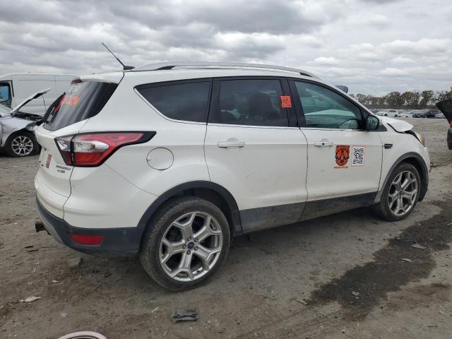 Photo 3 from auction – 2017 FORD ESCAPE TIT with VIN 1FMCU9J96HUD06574