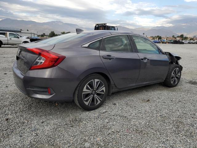 Photo 3 from auction – 2018 HONDA CIVIC EX with VIN JHMFC1F39JX028475