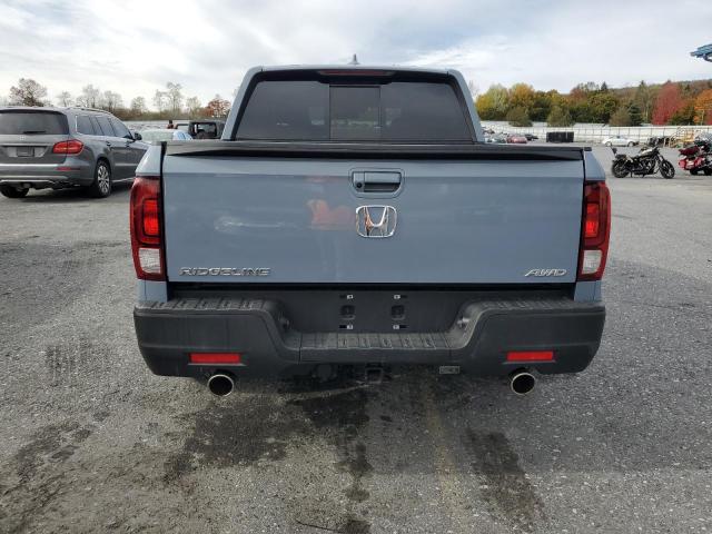 Photo 6 from auction – 2023 HONDA RIDGELINE with VIN 5FPYK3F58PB038547