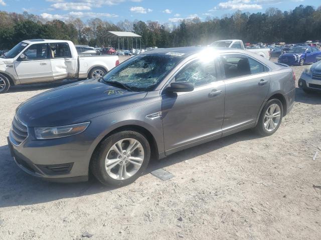 FORD TAURUS SEL 2014 with VIN 1FAHP2E83EG171063 - Photo from auction