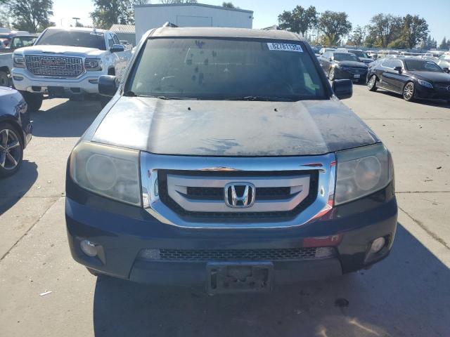 Photo 5 from auction – 2011 HONDA PILOT EXLN with VIN 5FNYF3H7XBB048873