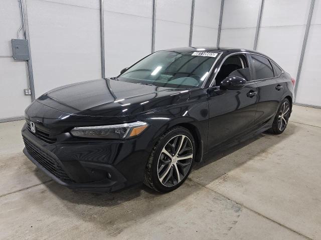 HONDA CIVIC TOUR 2023 with VIN 2HGFE1F91PH312018 - Photo from auction
