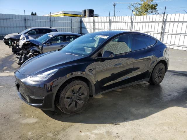 TESLA MODEL Y 2023 with VIN 7SAYGDEE4PA043990 - Photo from auction