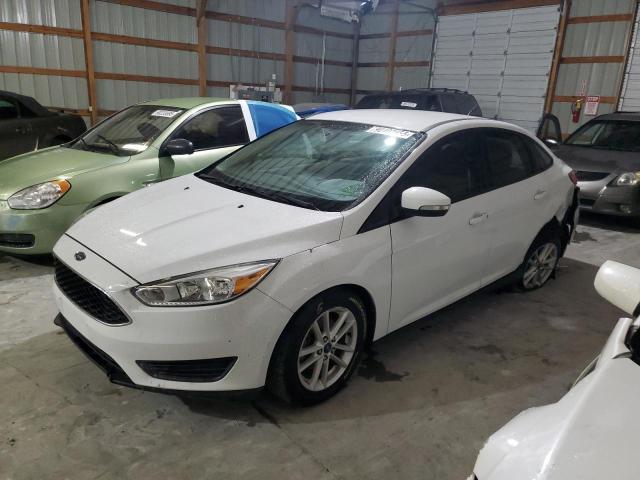 FORD FOCUS SE 2016 with VIN 1FADP3F24GL355095 - Photo from auction