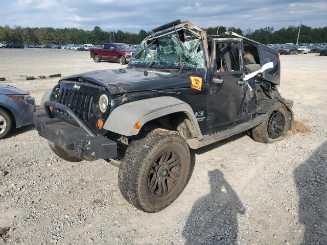 JEEP WRANGLER U 2009 with VIN 1J4GB39119L780313 - Photo from auction