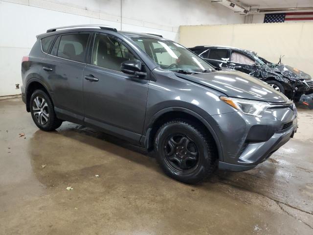 Photo 4 from auction – 2016 TOYOTA RAV4 LE with VIN JTMBFREV5GD180353