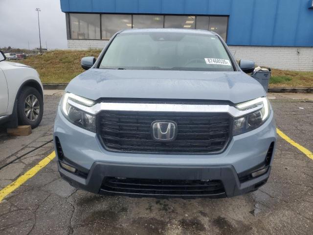 Photo 5 from auction – 2023 HONDA RIDGELINE with VIN 5FPYK3F76PB013972