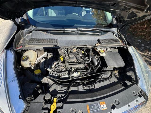 Photo 7 from auction – 2017 FORD ESCAPE SE with VIN 1FMCU9GD1HUE81634