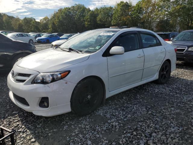 TOYOTA COROLLA BASE 2011 with VIN 2T1BU4EE2BC690514 - Photo from auction