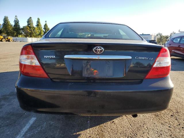 Photo 6 from auction – 2002 TOYOTA CAMRY LE with VIN JTDBE32K020098315