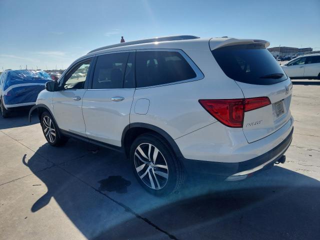 Photo 2 from auction – 2018 HONDA PILOT ELIT with VIN 5FNYF6H05JB043261