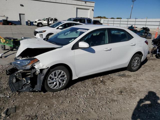 TOYOTA COROLLA L 2019 with VIN 5YFBURHE2KP885084 - Photo from auction