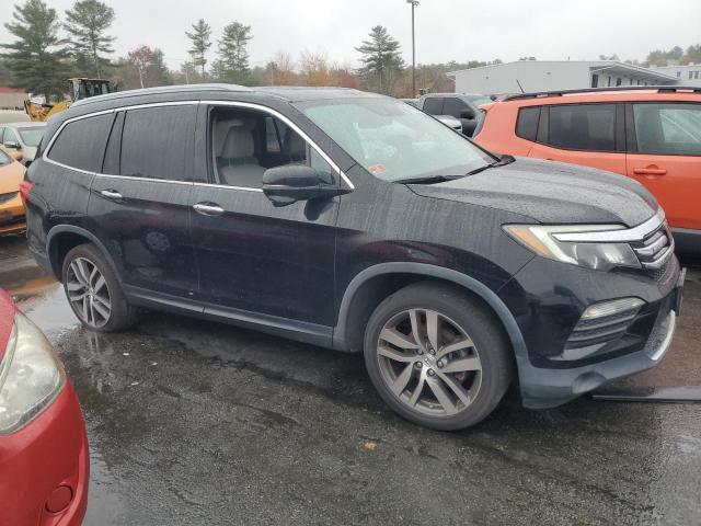 Photo 4 from auction – 2016 HONDA PILOT TOUR with VIN 5FNYF6H96GB128147