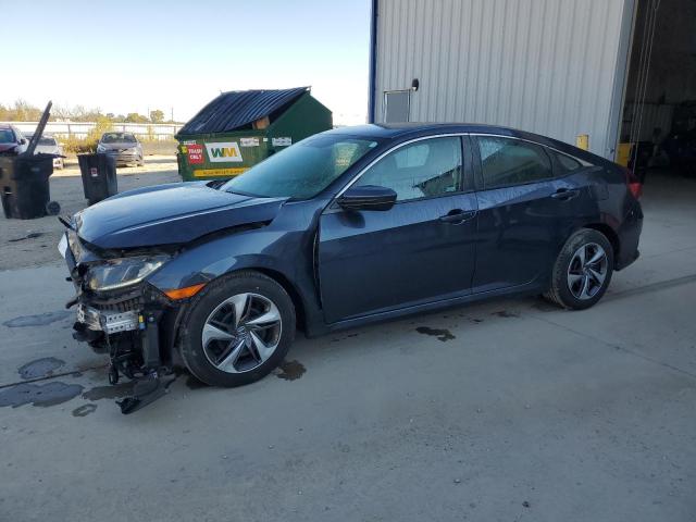 Photo 1 from auction – 2019 HONDA CIVIC LX with VIN 19XFC2F67KE034570