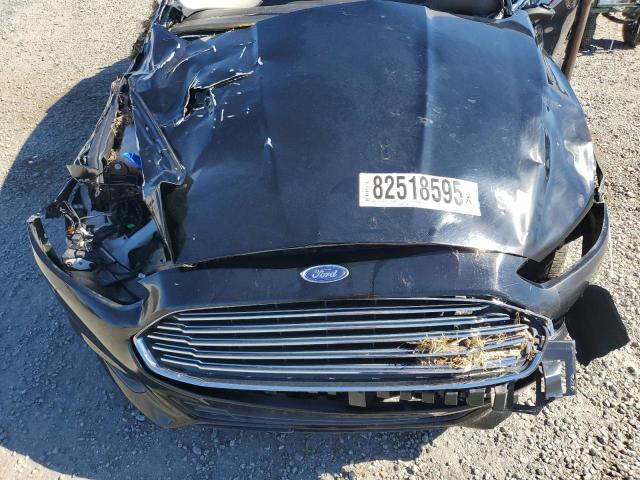 Photo 11 from auction – 2016 FORD FUSION S with VIN 3FA6P0G74GR350398