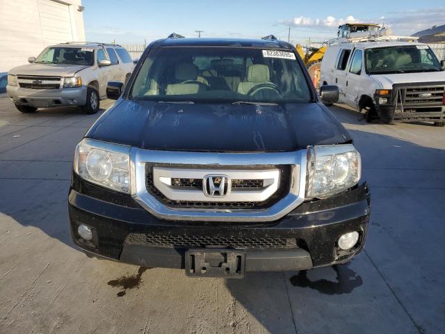 Photo 5 from auction – 2011 HONDA PILOT EX with VIN 5FNYF4H4XBB057911