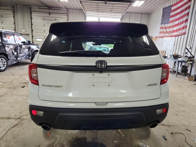 Photo 6 from auction – 2021 HONDA PASSPORT E with VIN 5FNYF8H52MB003912