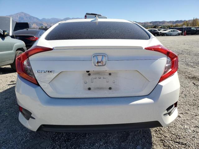 Photo 6 from auction – 2018 HONDA CIVIC EX with VIN JHMFC1F34JX035995