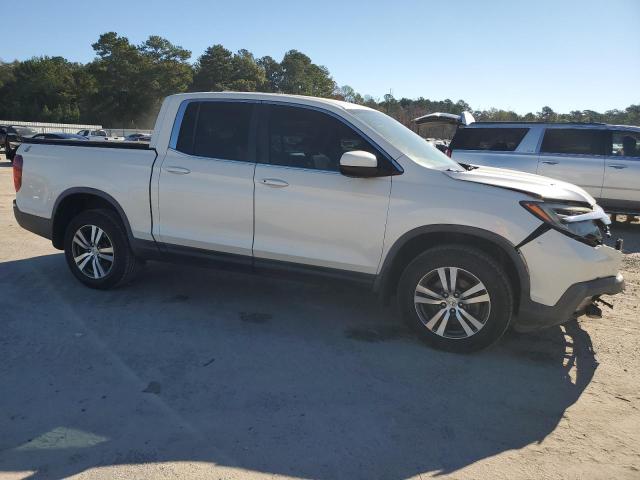Photo 4 from auction – 2017 HONDA RIDGELINE with VIN 5FPYK3F43HB015119