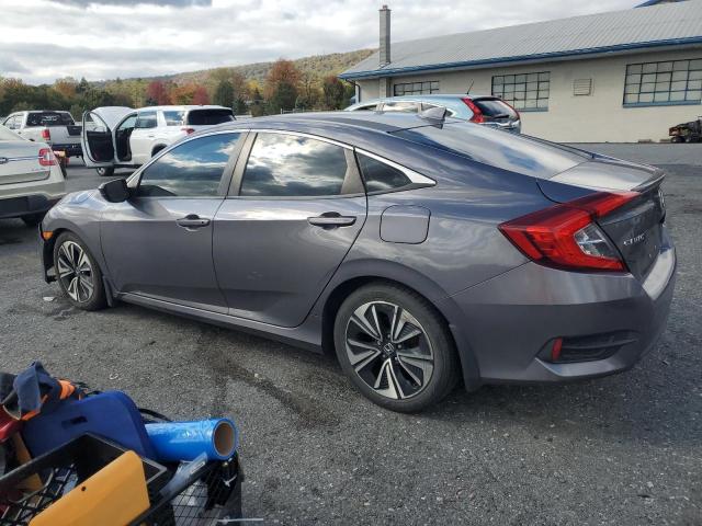 Photo 2 from auction – 2017 HONDA CIVIC EX with VIN 2HGFC1F36HH638691