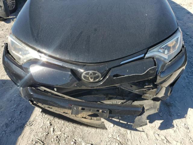 Photo 11 from auction – 2018 TOYOTA RAV4 LE with VIN 2T3BFREV7JW755191