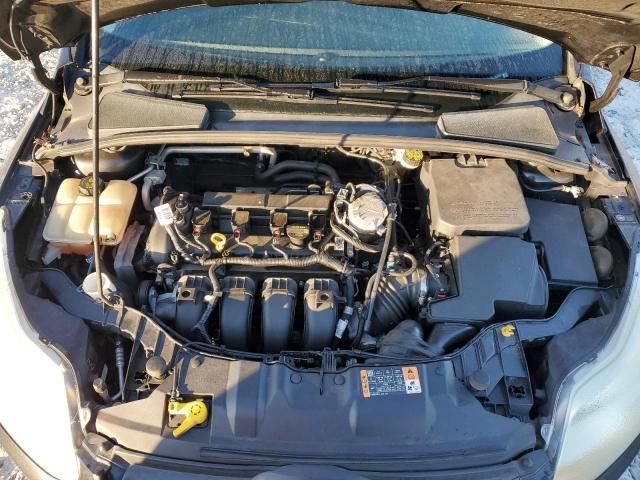 Photo 11 from auction – 2014 FORD FOCUS SE with VIN 1FADP3F25EL353370