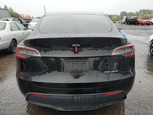 Photo 6 from auction – 2021 TESLA MODEL Y with VIN 5YJYGDEE2MF243763