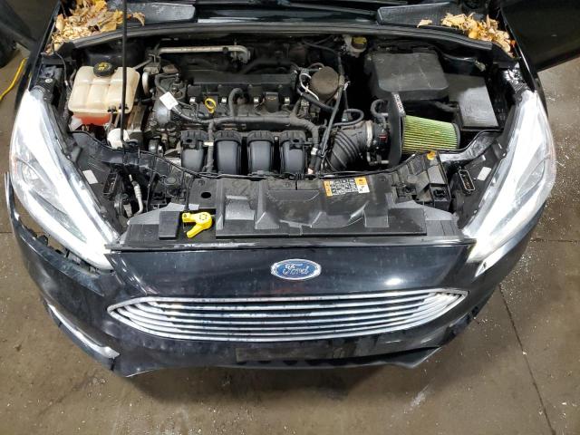 Photo 12 from auction – 2016 FORD FOCUS TITA with VIN 1FADP3N22GL301554