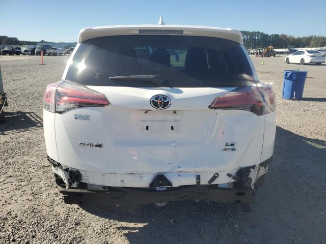 Photo 6 from auction – 2018 TOYOTA RAV4 LE with VIN JTMBFREV6JJ204085